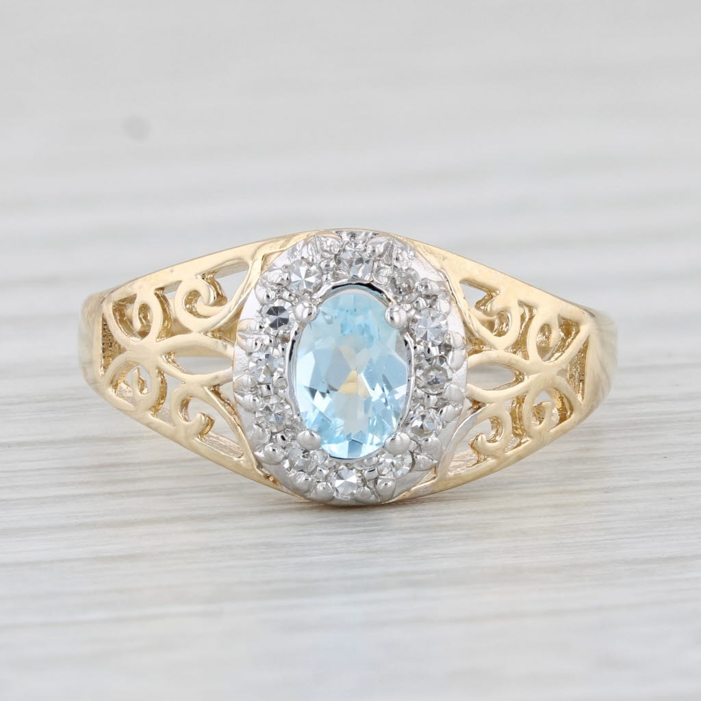 0.58ctw Oval Blue Topaz Diamond Halo Ring 14k Yellow Gold Size 7.5 - Elegant Openwork Design for Engagement, Anniversary & Special Occasion Gifts