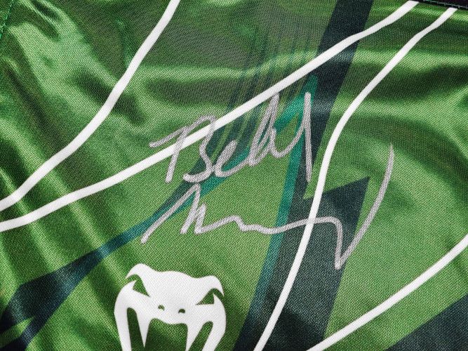 Belal Muhammad Autographed Green MMA Fight Shorts - Custom Signed UFC Trunks for Collectors & Fans - Perfect for Memorabilia Displays & Sports Gifts