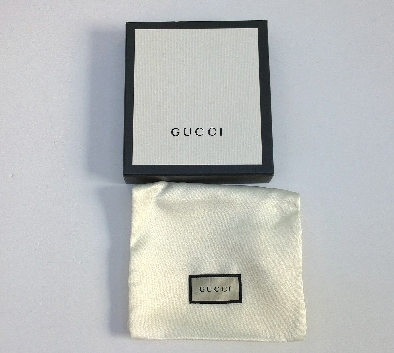 Authentic Gucci Red Textured Leather Wallet with Printed GG Logo - Perfect for Everyday Use & Luxury Gift Giving
