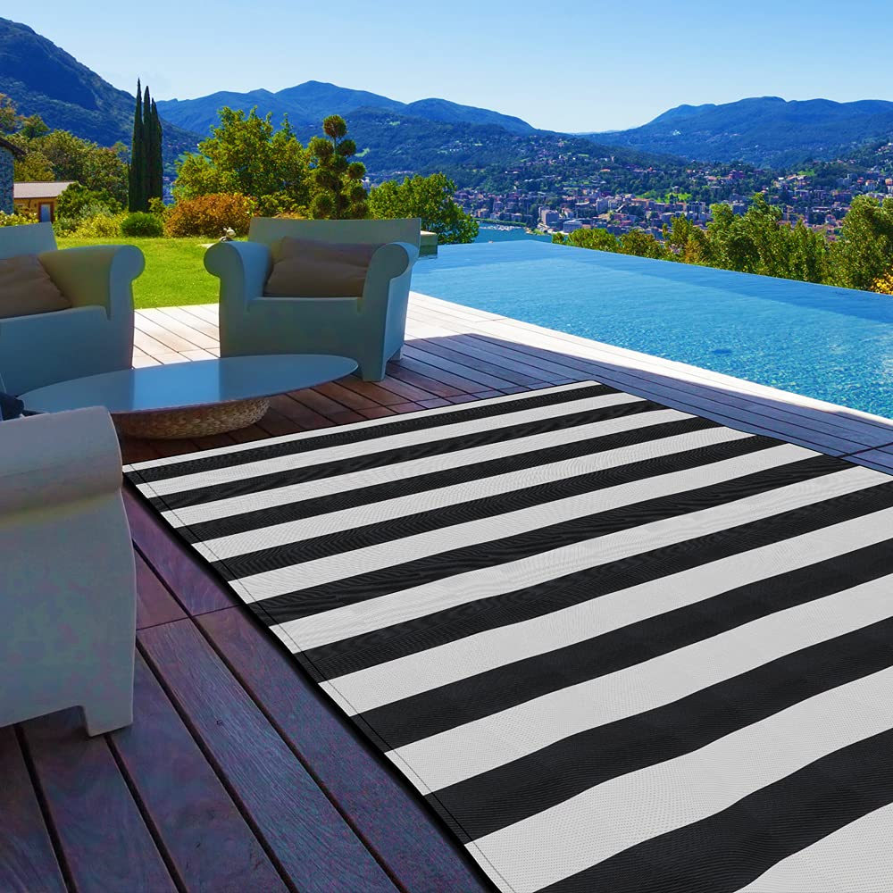 PCINFUNS 6'x9' Waterproof Plastic Straw Rug - Reversible Outdoor Patio Mat for RV, Deck, Porch, Camping, Picnic, Beach & Balcony - Easy Foldable & Durable (Black & White) - Perfect for Summer Gatherings and Backyard Relaxation