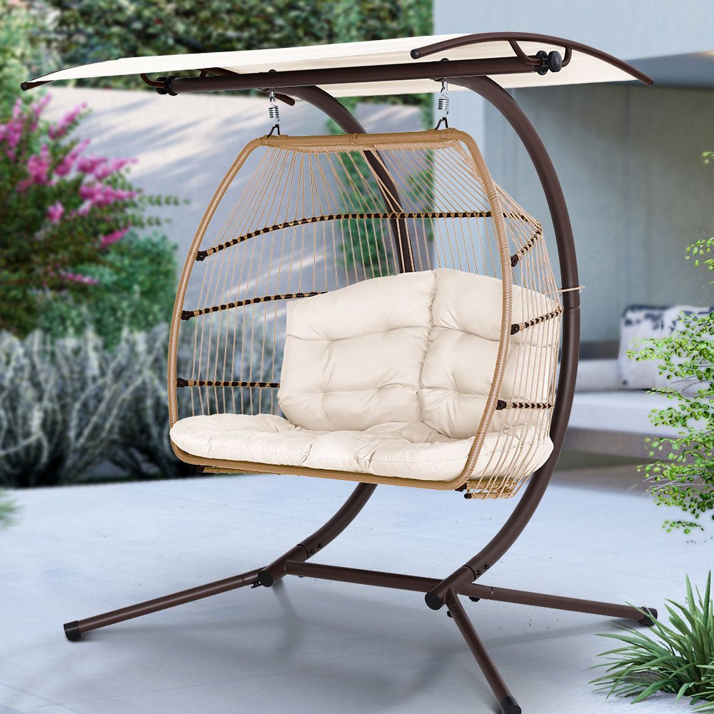 Double Wicker Hanging Swing Chair with Stand - Latte Brown Rattan Porch Swing for Outdoor Patio, Garden, or Balcony Relaxation - Perfect for Reading, Lounging, and Enjoying Nature