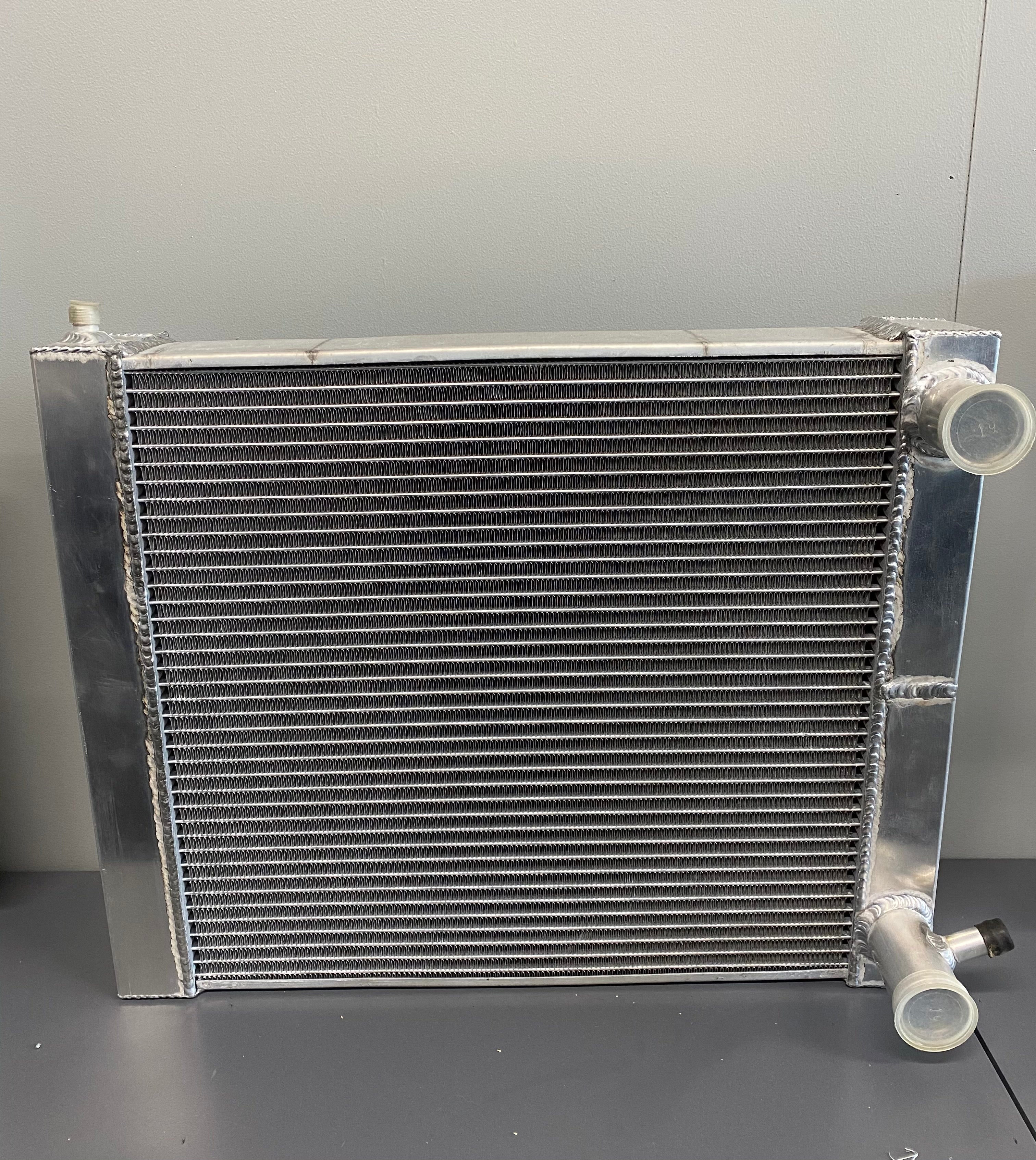 Universal Radiator with Left or Right Hand Outlets - Compatible with Most Vehicles for Home and Auto Repair