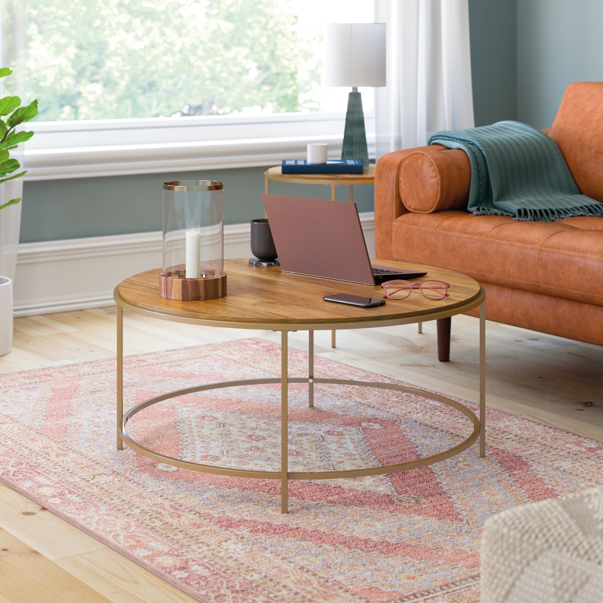 Sauder International Lux Round Modern Coffee Table with Chic Satin Gold Frame & Sindoori Mango Finish - Perfect for Living Room, Lounge, and Office Decor