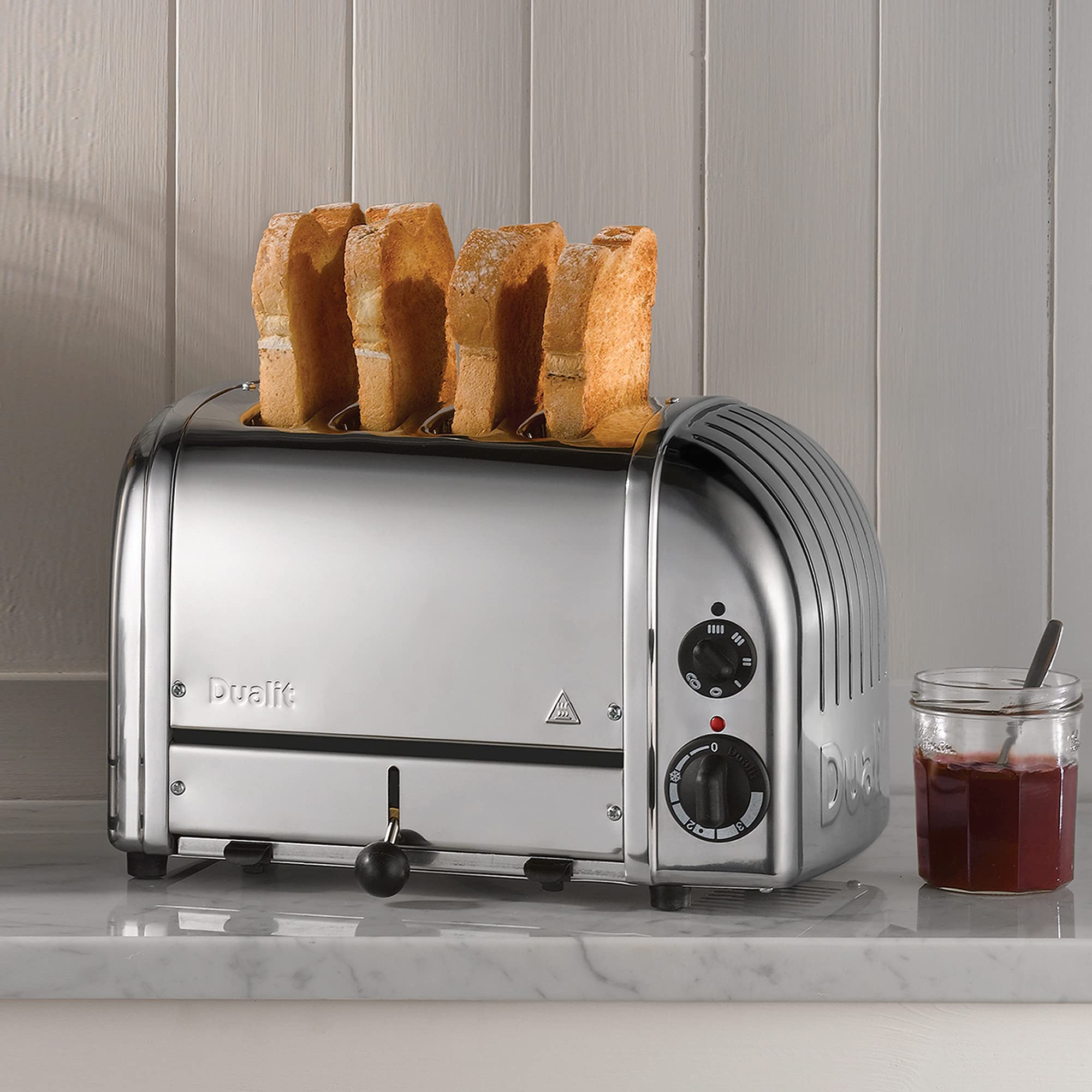Dualit Classic 4-Slice NewGen Toaster - Stainless Steel, Handcrafted in UK - Replaceable ProHeat Elements - Defrost & Reheat Function - Mechanical Timer - Perfect for Breakfast, Brunch & Entertaining