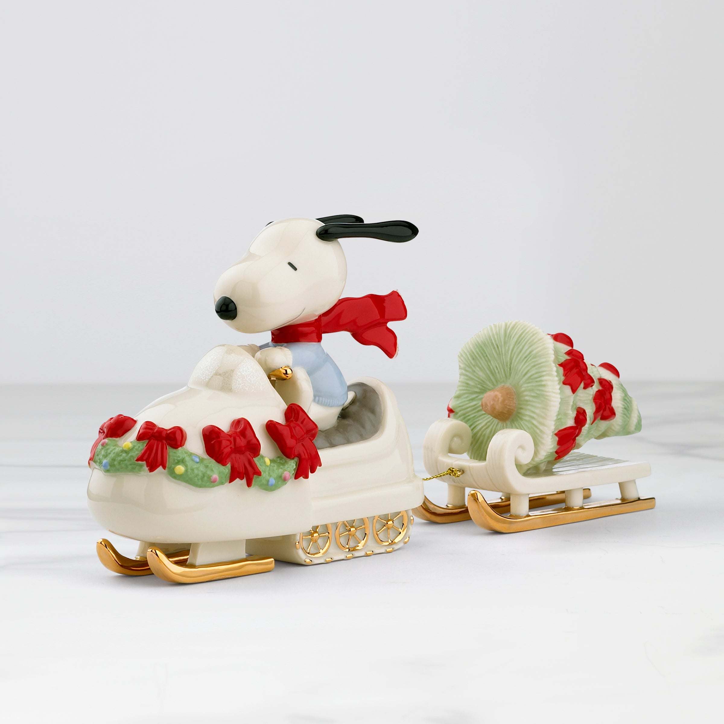 Fun Snoopy Snowmobiling Figurine - Collectible Peanuts Character Statue for Winter Decor & Gift Giving
