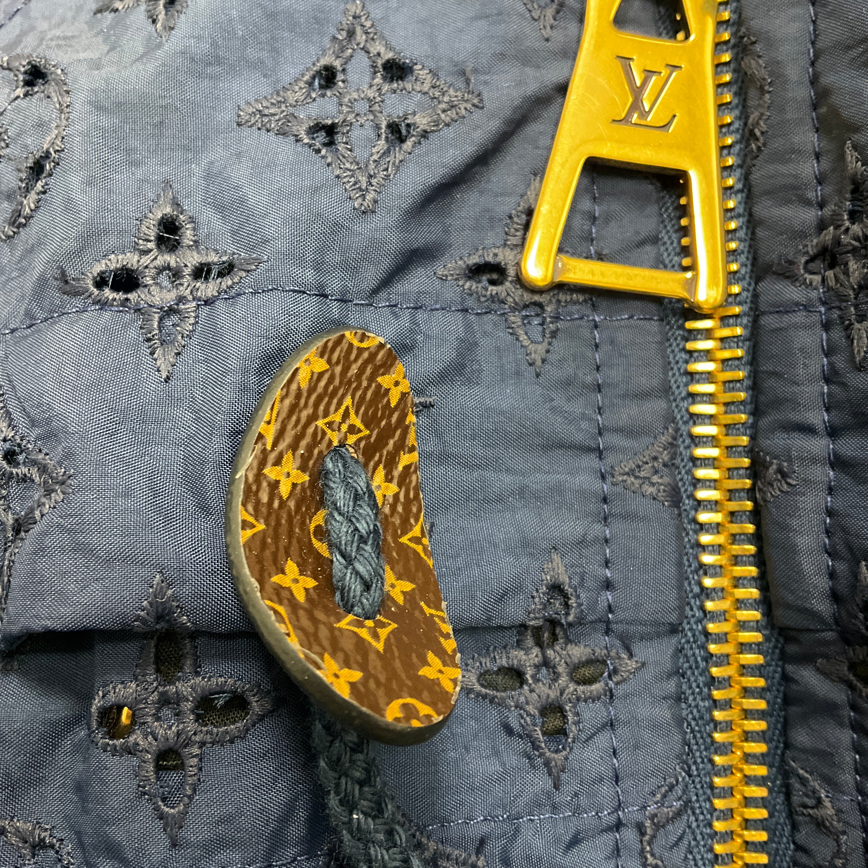 Louis Vuitton Navy Blue Monogram Hooded Zip Jacket with Eyelet Details | Waterproof Windbreaker for Outdoor Travel & Streetwear Fashion