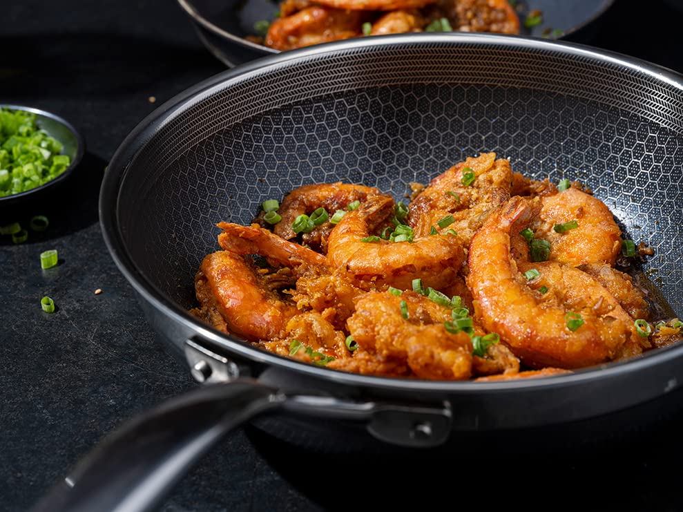 HexClad Hybrid Nonstick 10-Inch Wok Pan - Stay-Cool Handle, Dishwasher & Oven Safe to 900°F, Induction Compatible for All Cooktops - Perfect for Stir-Frying, Sautéing & Asian Cooking