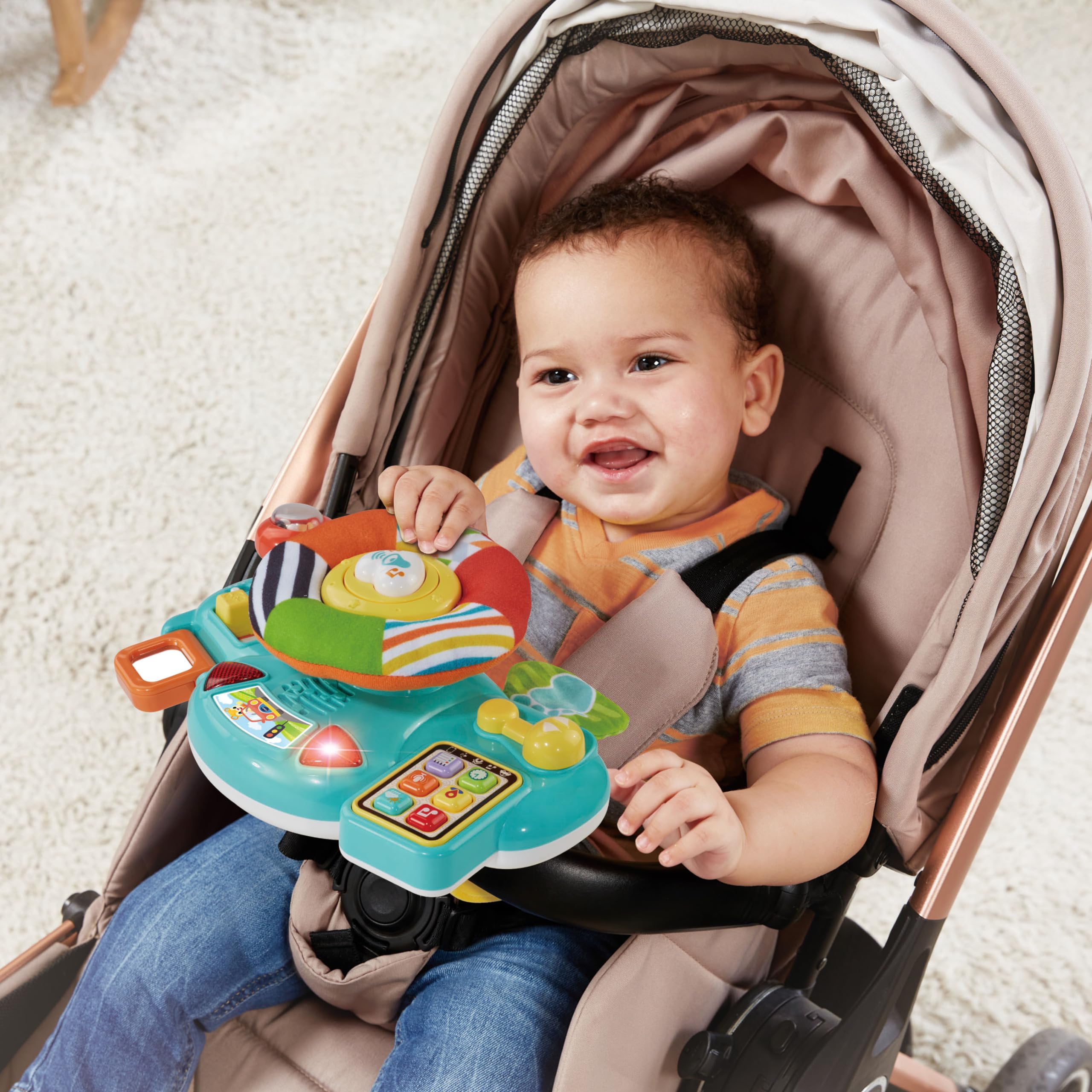 VTech Baby Steering Wheel Toy - Interactive Car Seat & Stroller Activity Toy with Lights, Sounds & Games - Best Gift for Babies 6+ Months - Spanish Language Content - Perfect for Road Trips & Stroller Rides