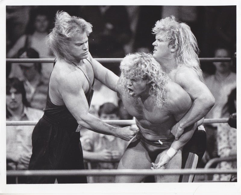 1990 WCW Midnight Express vs. Flyin' Bryan Press Photo - Vintage Wrestling Promo Picture - Perfect for Collectors, Memorabilia Displays & Wrestling History Enthusiasts
