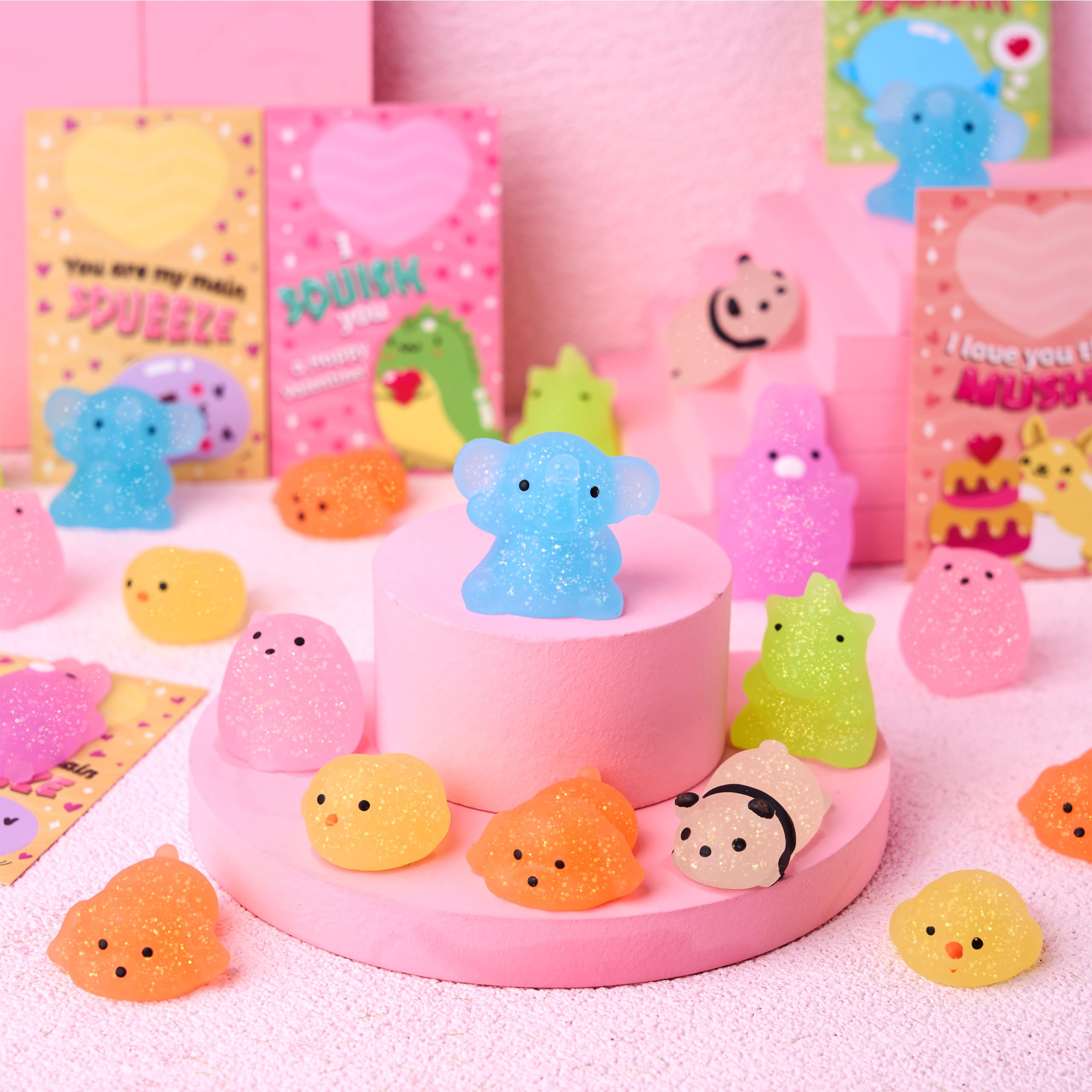 JOYIN 28 Pack Glitter Mochi Squishy Toys with Gift Cards - Stress Relief Fidget Toys for Kids, Valentine's Party Favors, Classroom Prizes & Exchange Gifts - Perfect for Birthday Parties, School Rewards and Sensory Play