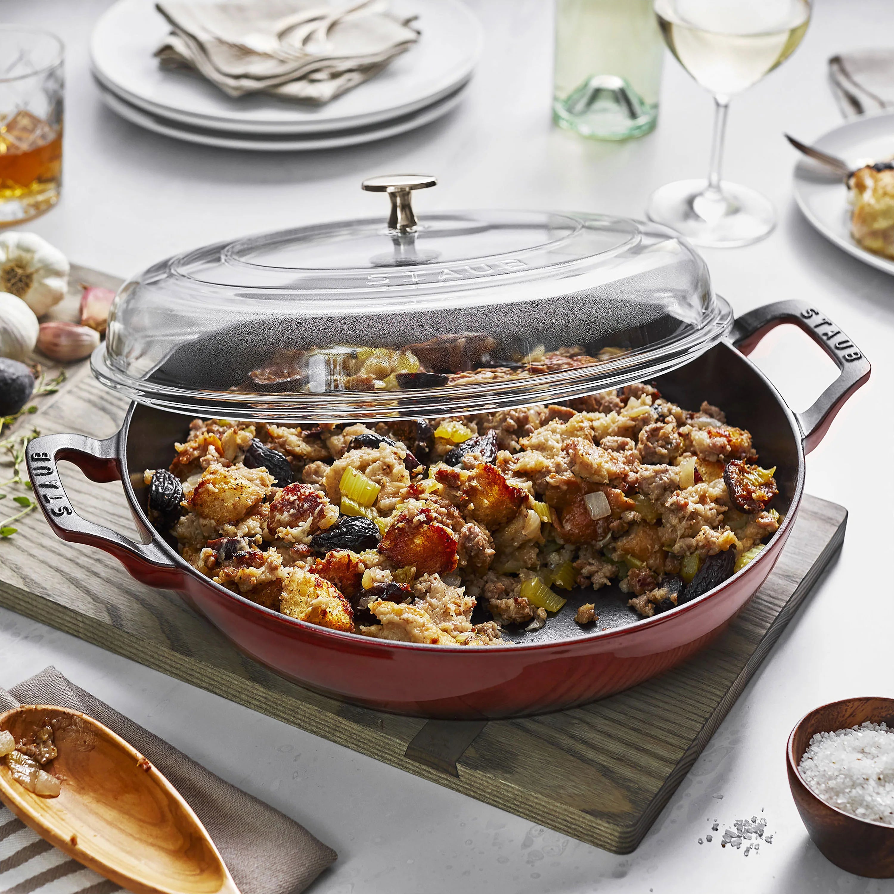 Staub Cast Iron Braiser with Glass Lid - 5.5 QT Grenadine Red Enameled Dutch Oven for Roasting, Baking & Searing - Perfect for Stovetop, Oven & Camping Cooking