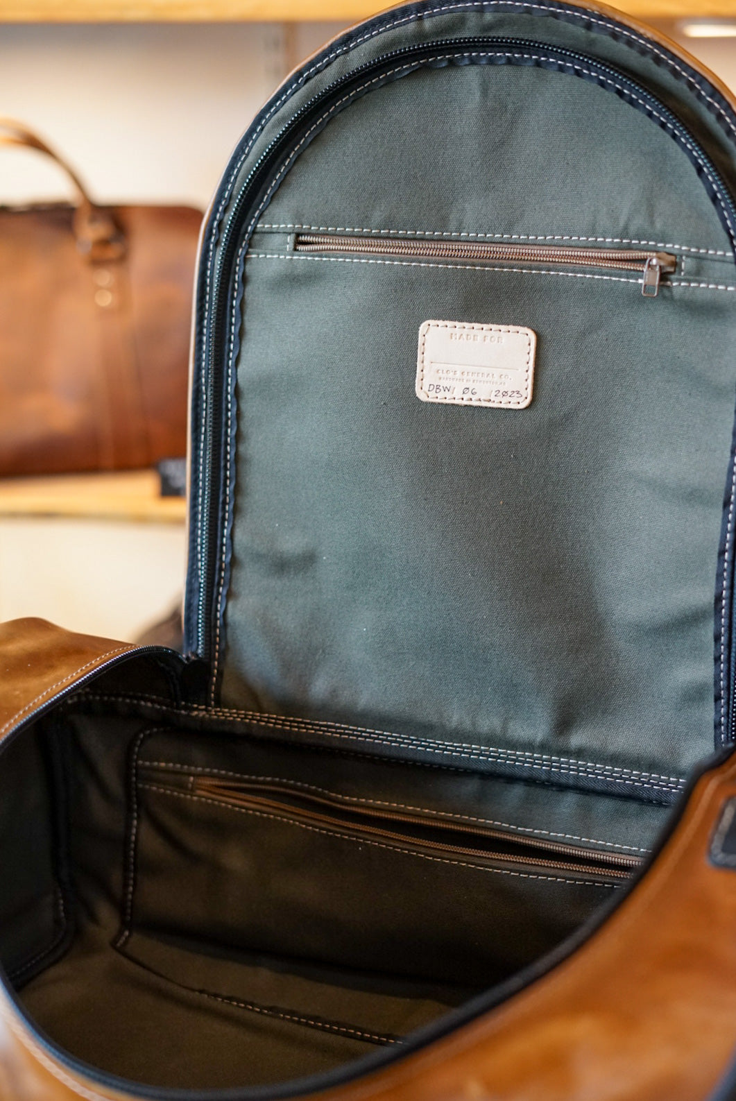 Duffleback Warrior Backpack - Two Tone Golden Maple Brown & Flat Black Accents - Durable Travel & Gym Bag for Outdoor Adventures & Daily Commute