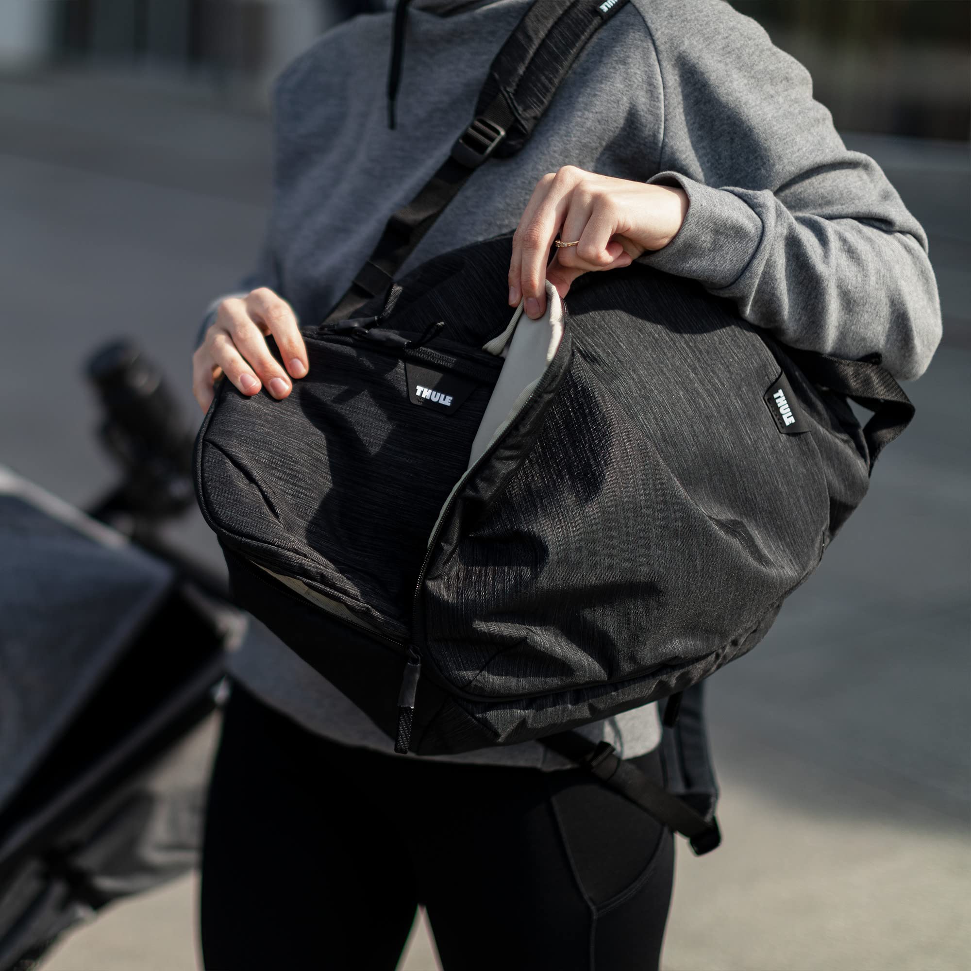 Thule Diaper Backpack for Travel & Maternity - Waterproof Baby Changing Bag with Adjustable Shoulder Straps - Perfect for Daycare, Airplane & Outdoor Adventures (Black)
