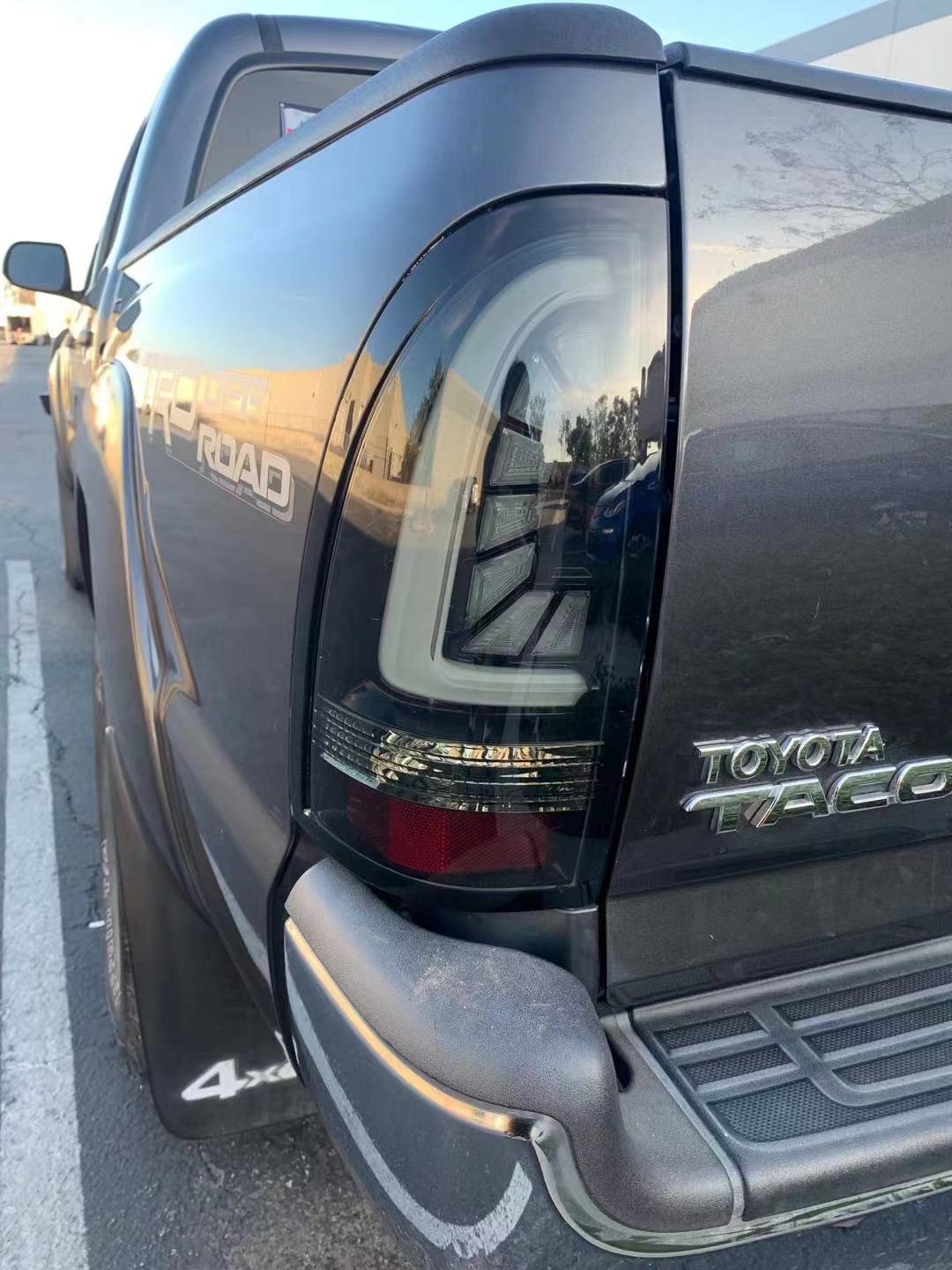 05-15 Toyota Tacoma PRO Series LED Tail Lights - Smoked Black - Enhanced Visibility & Style for Night Driving & Off-Road Adventures