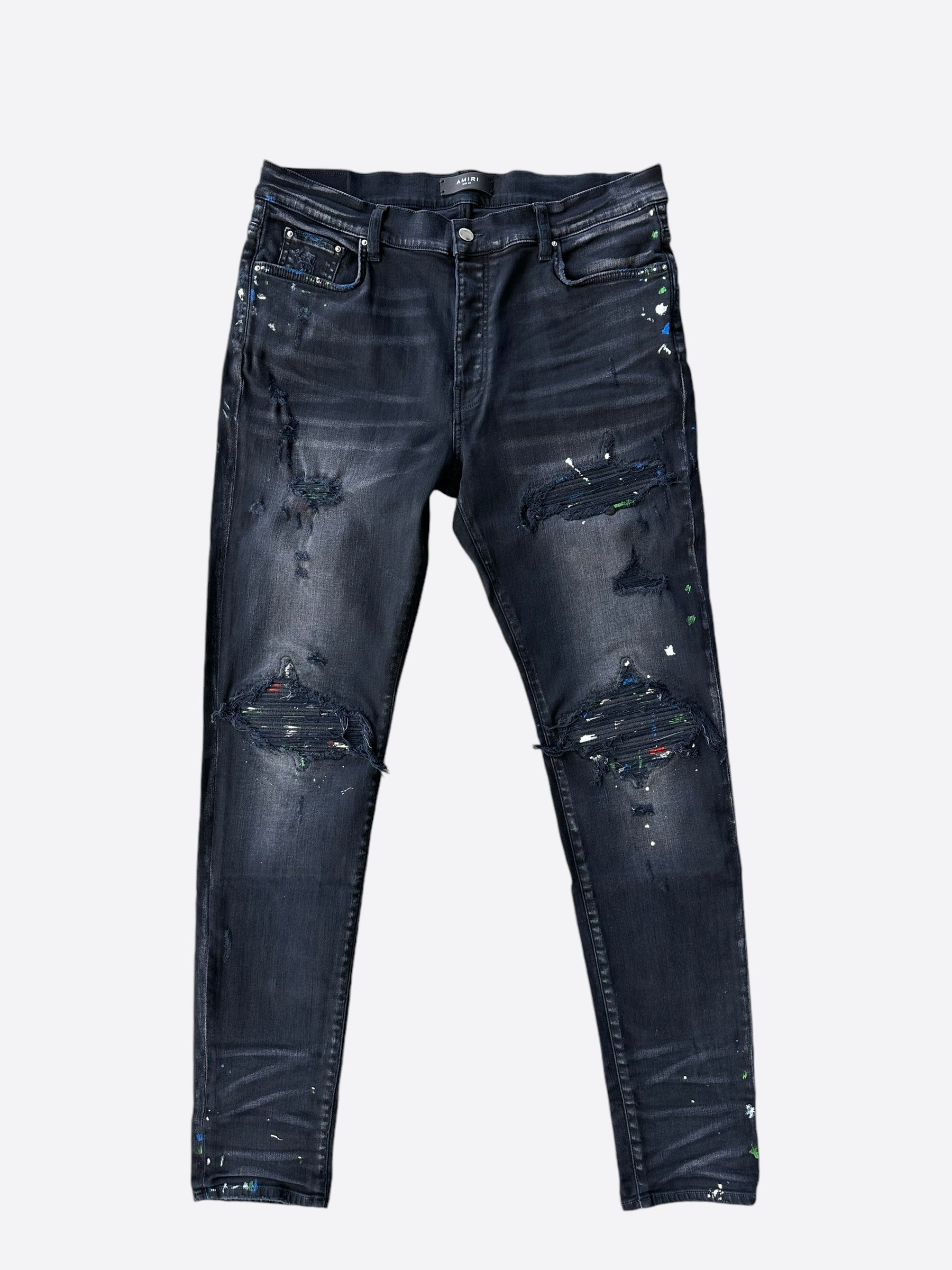 Amiri Aged Black Paint Splatter MX1 Jeans for Men | Distressed Designer Denim | Perfect for Streetwear & Night Out Fashion
