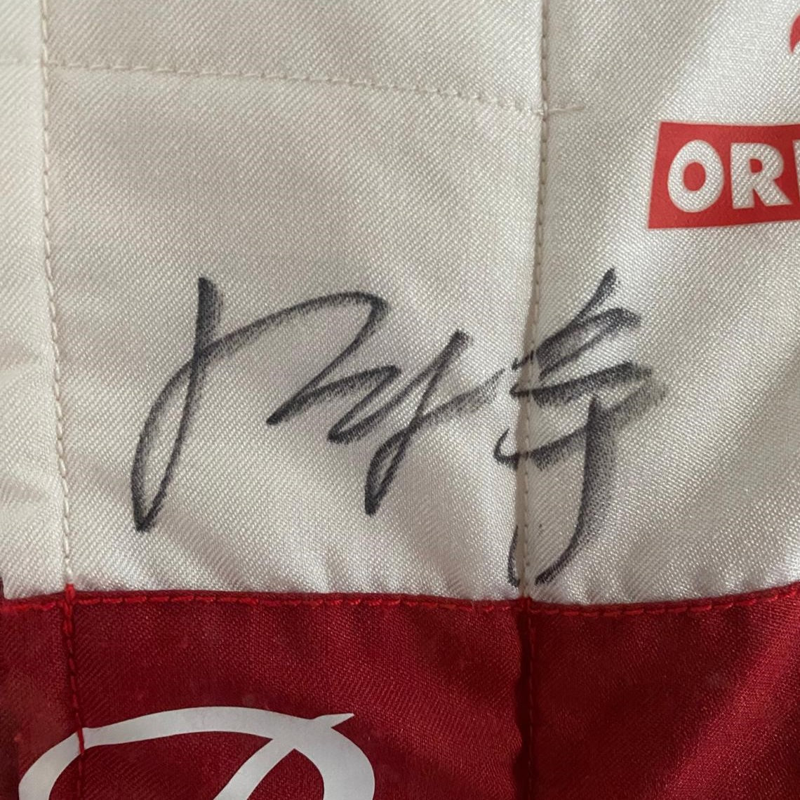 Authentic Signed Race-Worn Zhou Guanyu F1 Suit - Gulf Air Bahrain Grand Prix 2023 | Collectible Motorsport Memorabilia for Display & Investment