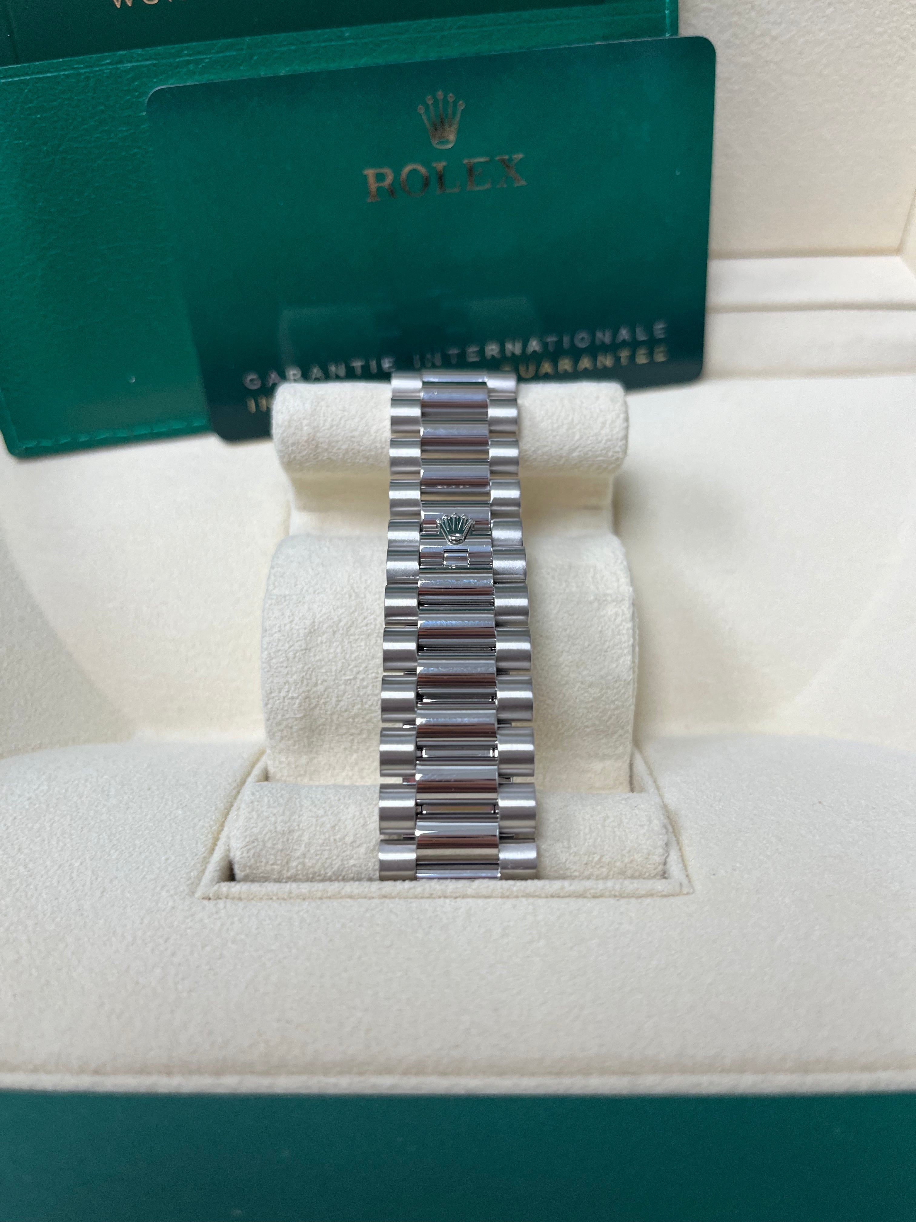 Rolex Day Date 40 White Gold Men's Watch with Black Baguette Diamond Dial & Fluted Bezel - Luxury Dress Watch for Business & Formal Occasions