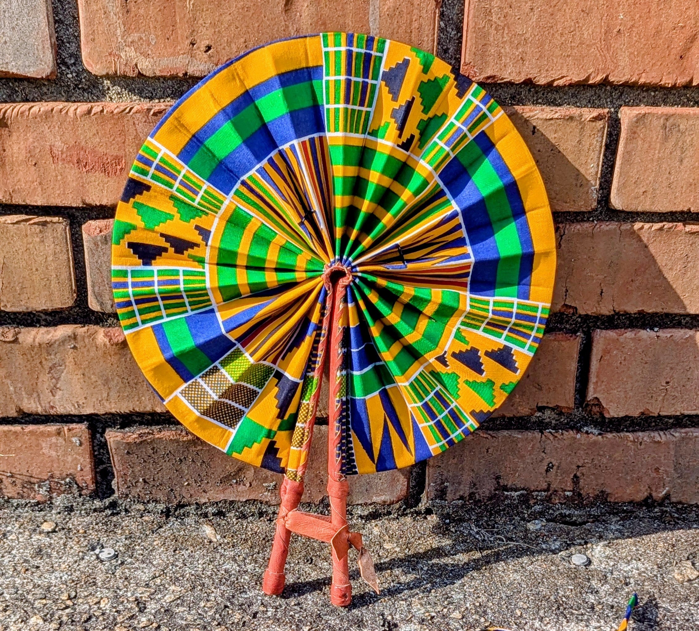Dupsie's Afiokuma Foldable African Print Kente Hand Fan with Leather Handle DPPF4075 - Stylish Cooling Accessory for Weddings, Parties & Cultural Events