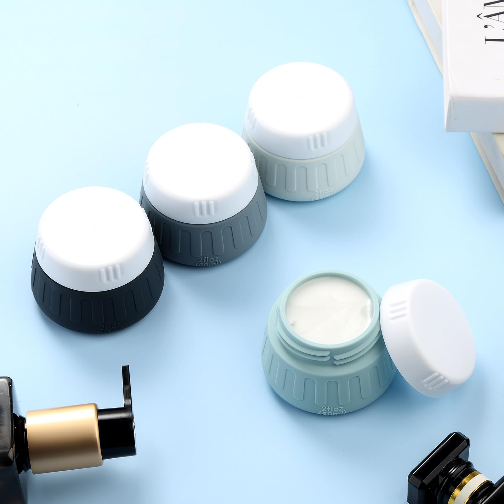 Gemice 2 oz Travel Containers for Toiletries - 4-Pack TSA Approved Leak-Proof Silicone Jars for Shampoo, Lotion & Cleanser | Perfect for Air Travel, Gym Bag & On-the-Go Essentials