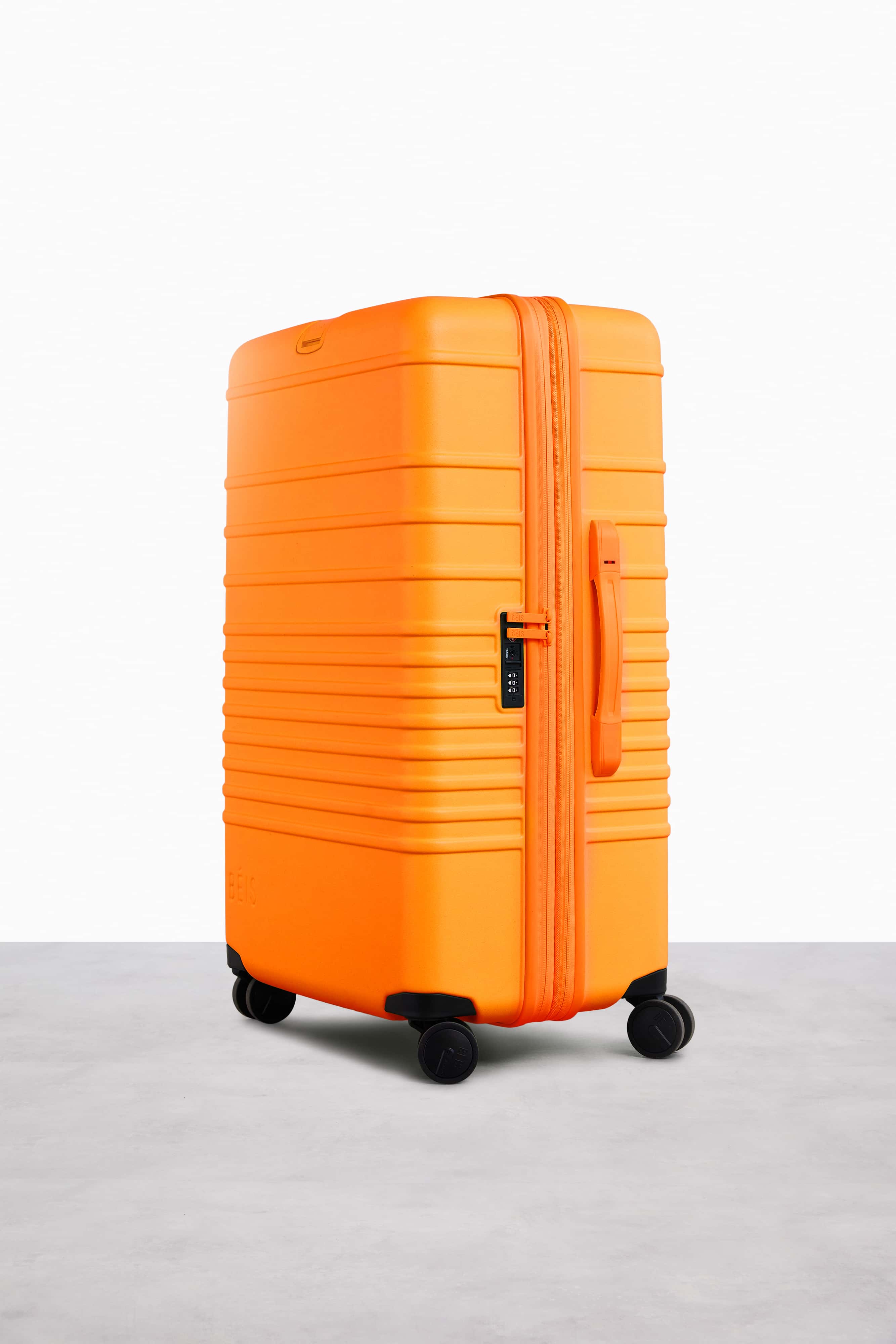 Large Check-In Roller Suitcase in Creamsicle - Spacious & Durable Travel Luggage for Airlines, Vacations & Business Trips