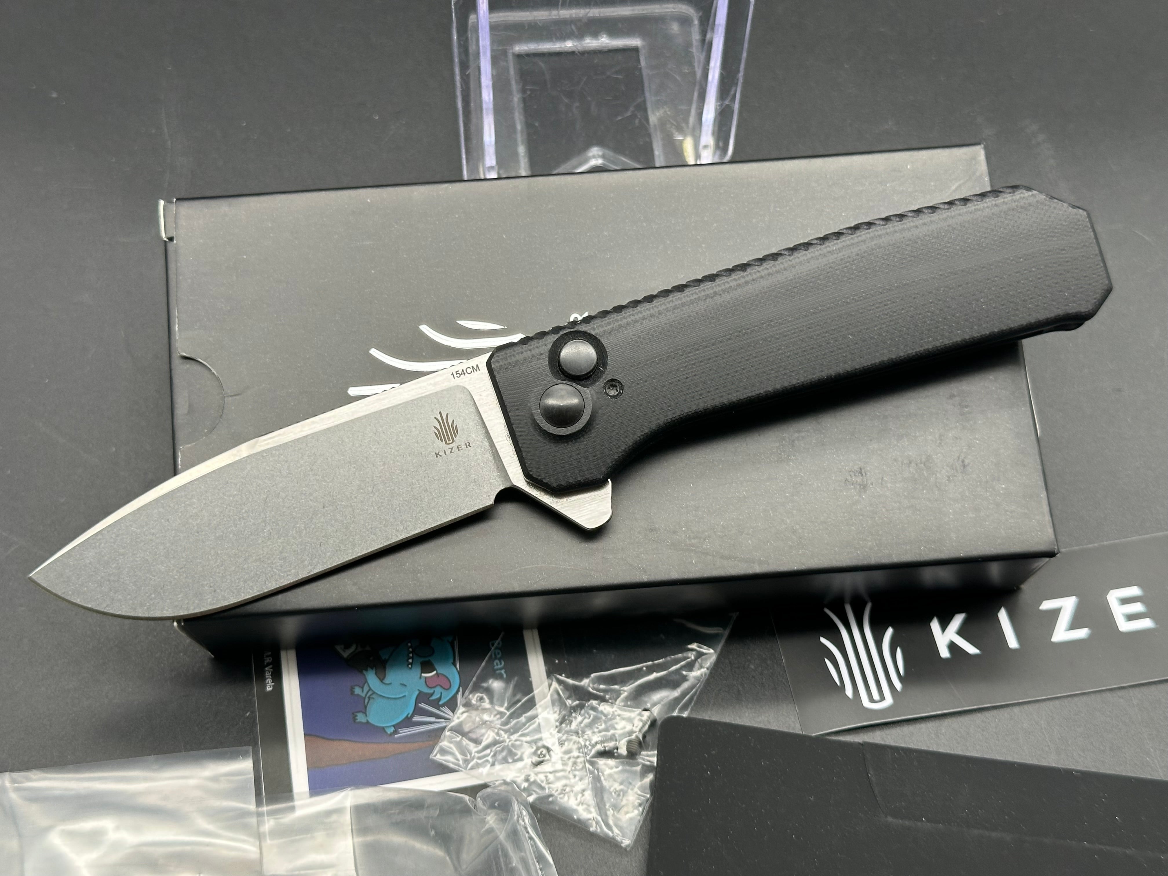 KIZER BRAT Button Lock Folding Knife - Black G10 Handle, 154CM Stainless Steel Plain Edge Blade - EDC Pocket Knife for Camping, Hiking & Outdoor Activities