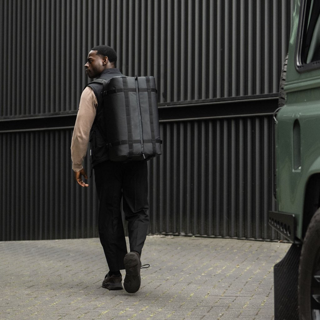 GRID Duffel Backpack - Waterproof Travel Gym Bag with Laptop Compartment | Perfect for Workouts, Business Trips & Weekend Getaways