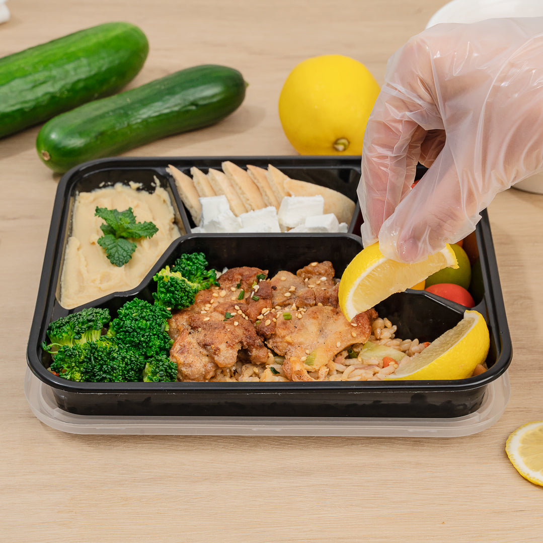 34 oz Black Plastic 4-Compartment Meal Prep Containers with Clear Lids - Microwave Safe (8.75