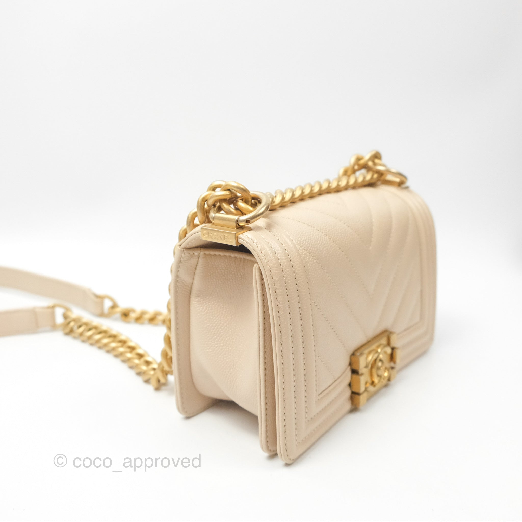 Chanel Chevron Small Boy Bag in Cream Ivory Caviar Leather with Aged Gold Hardware - Perfect for Luxury Fashion & Everyday Elegance