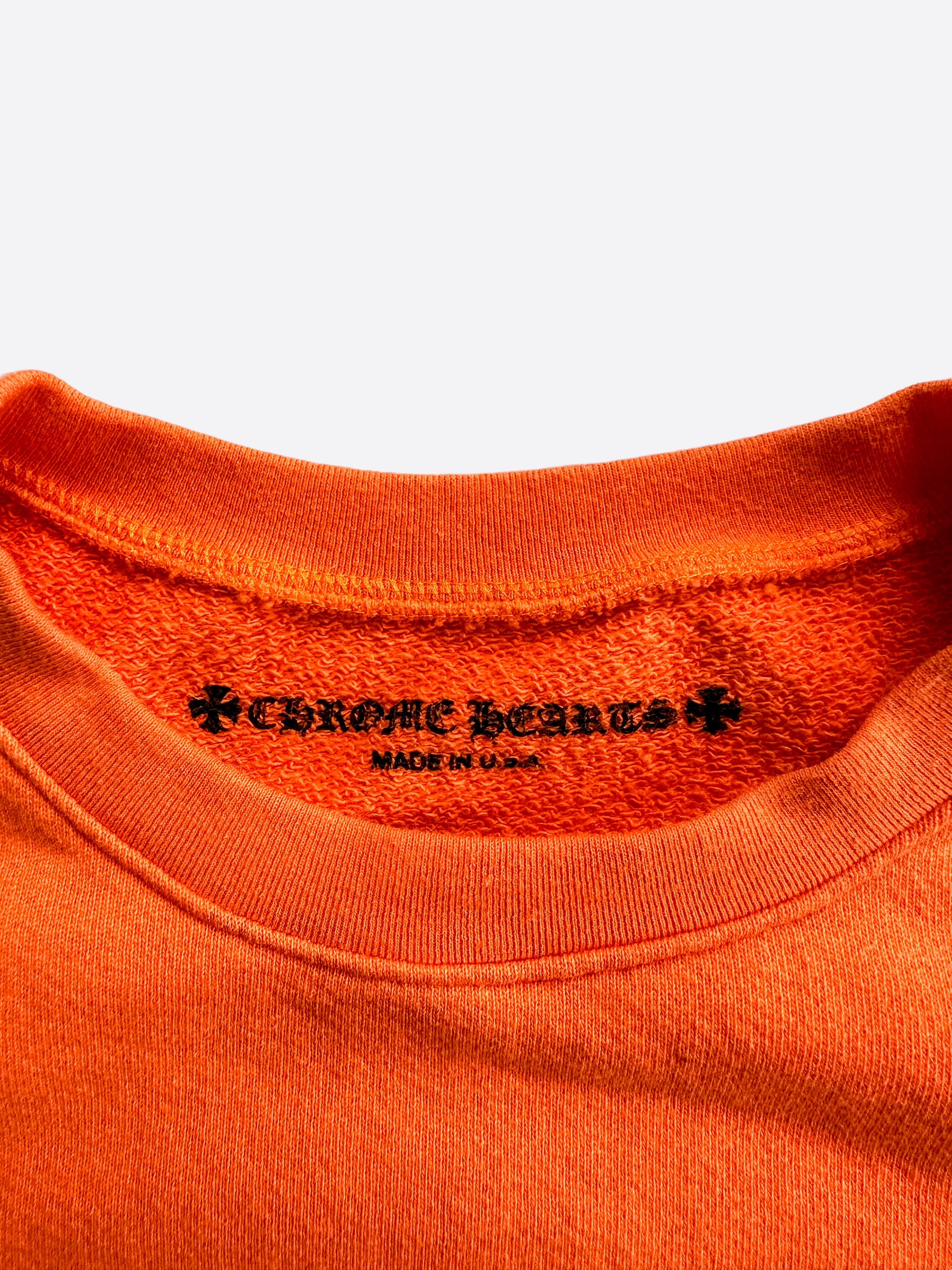 Chrome Hearts Orange & Black Dagger Logo Sweater - Stylish Gothic Knitwear for Men & Women | Perfect for Streetwear, Concerts & Fashion Statements