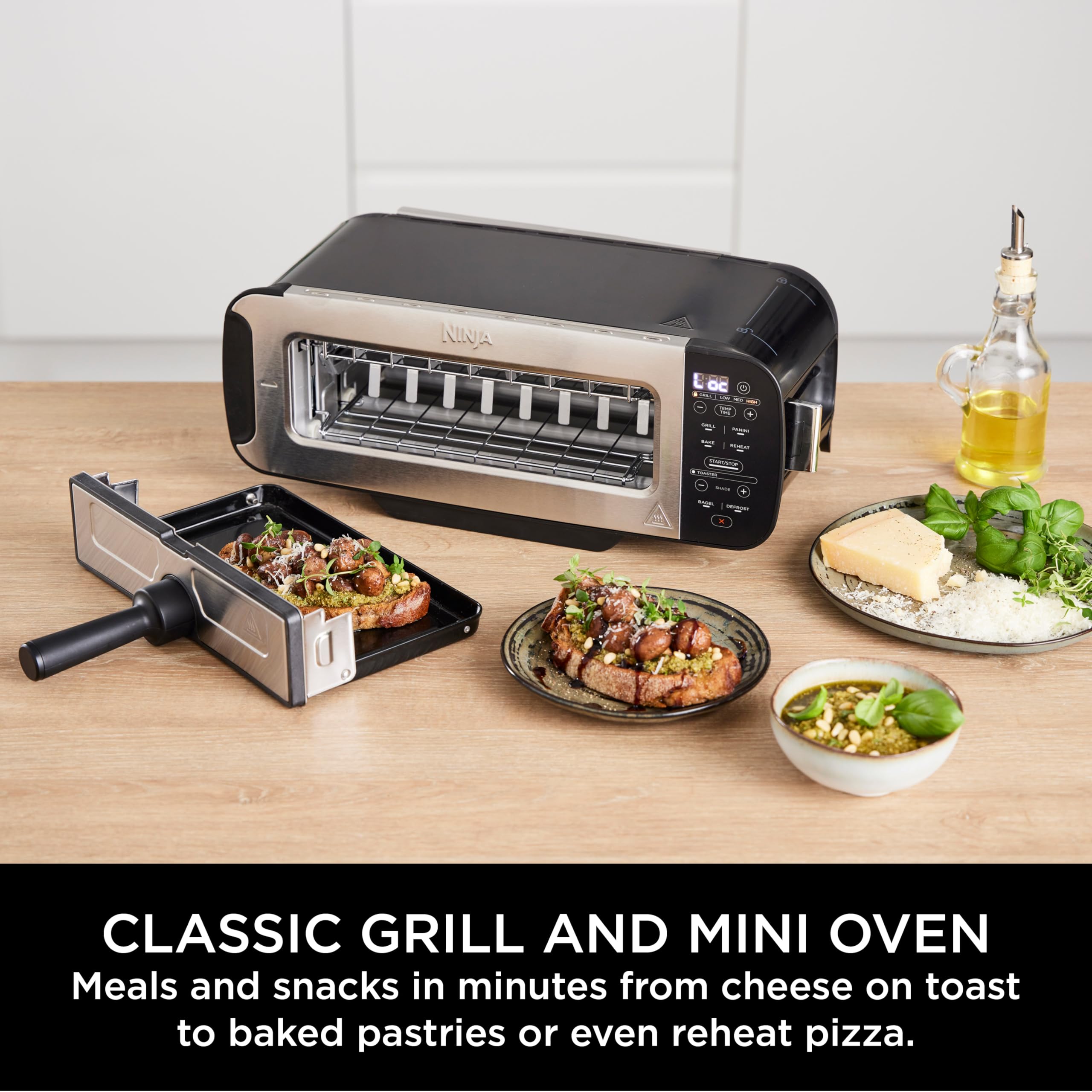 Ninja Foodi 3-in-1 Toaster, Grill & Panini Press - 7 Cooking Functions with Flip Design, 7 Toast Shades | Includes Panini Press, Bake Tray & Crumb Tray | Perfect for Breakfast, Sandwiches & Grilling at Home | Black ST200UK