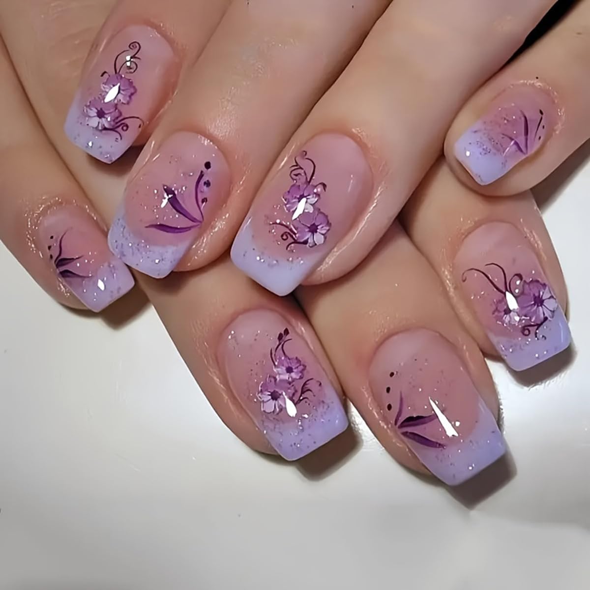 Purple French Press on Nails Short Square Fake Nails - 24PCS Nude False Nails with Purple Flower Glitter Design, Full Cover Acrylic Glue on Nail Tips for Women | Perfect for Parties, Weddings & Daily Wear