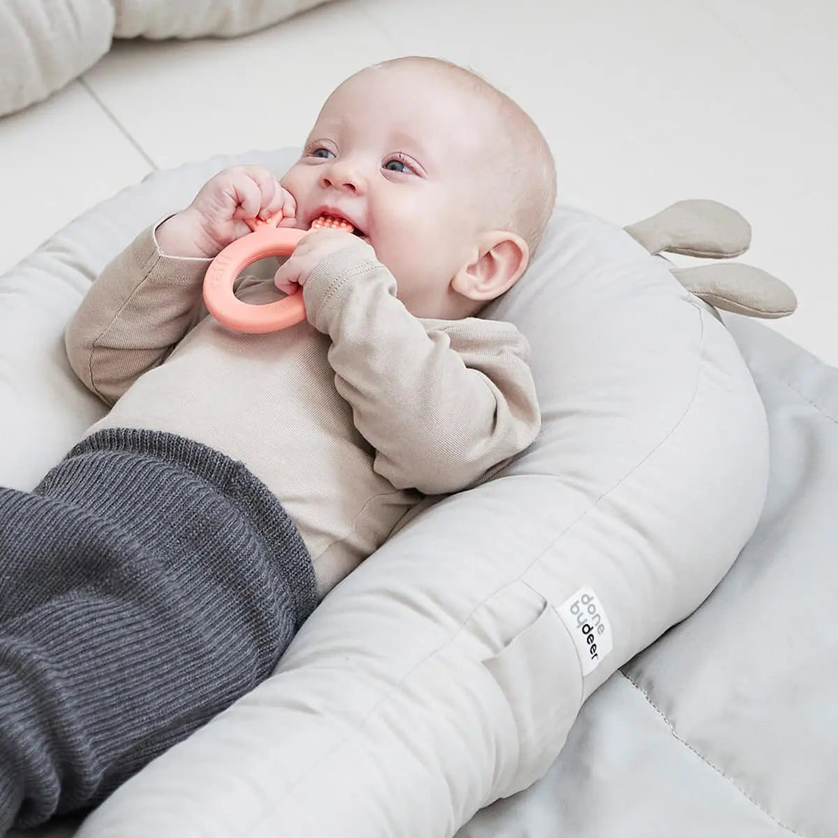 DONE BY DEER Cozy Baby Lounger with Activity Arch & Raffi Toy - Soft Infant Seat for Playtime, Tummy Time & Relaxation - Perfect for Newborns & Babies 0-12 Months